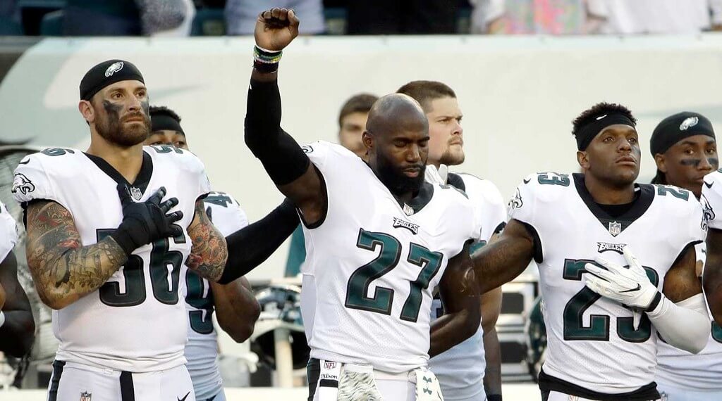 Malcolm Jenkins with his fist up in protest during the Anthem